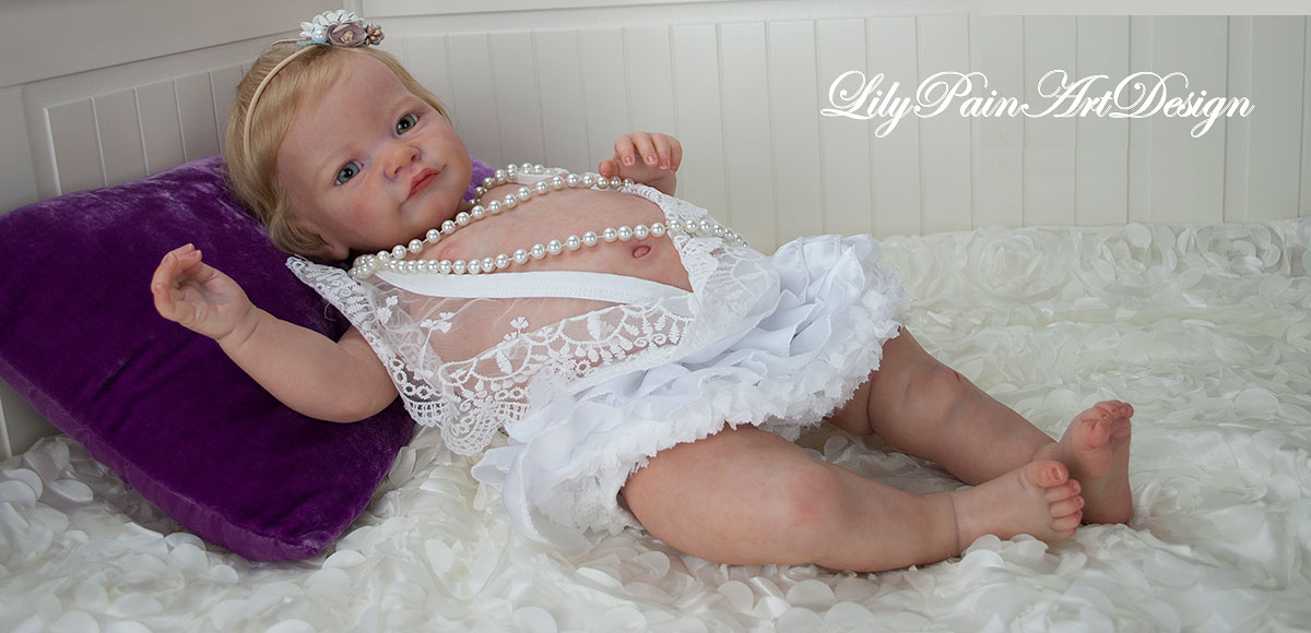 Reborn Baby with Rooted Hair, Glass Eyes and Chest Plate