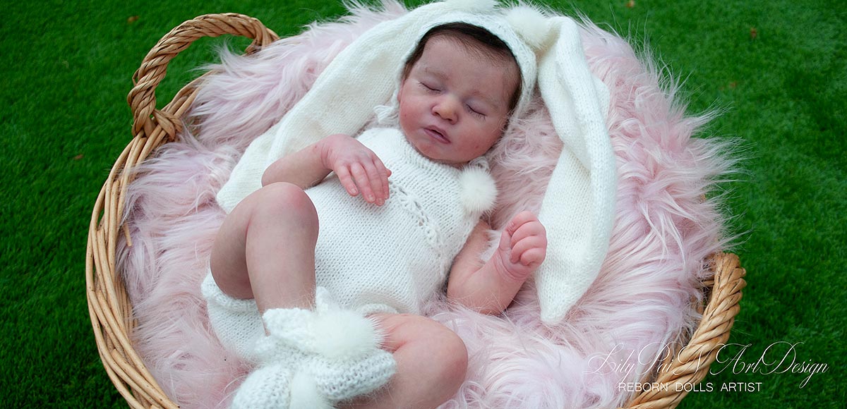 Reborn Baby with Mohair Rooted Hair and Closed Eyes