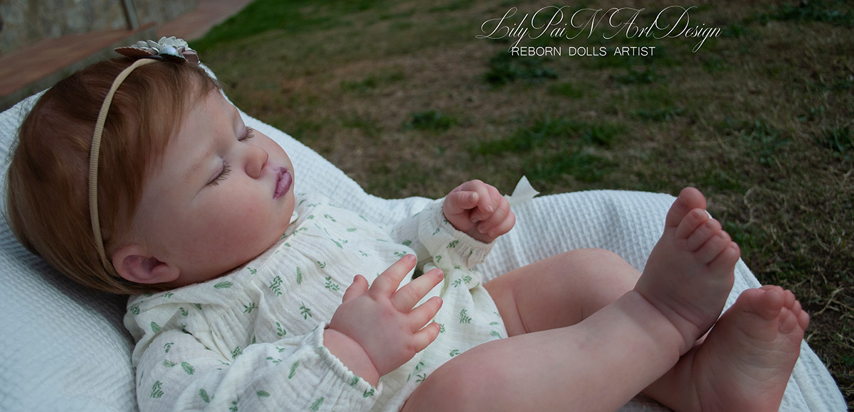 Large Reborn Baby with Rooted Hair, Realistic Skin Details and Closed Eyes